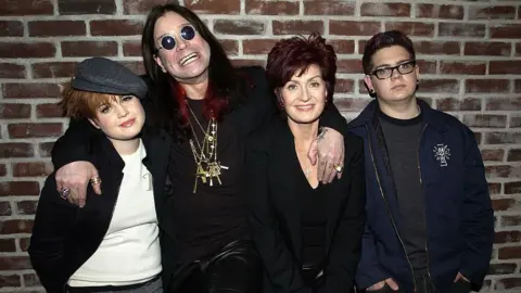 Getty Images Kelly Osbourne, Ozzy Osbourne, Sharon Osbourne and Jack Osbourne are seen in 2002