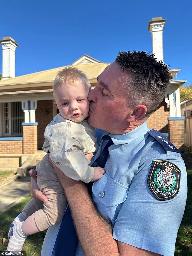 Mr Matts (pictured with his eight-month-old son Xavier) had been a NSW officer for 16 years