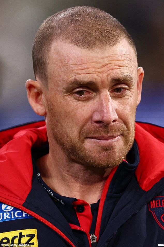 The disgraceful post came to light when Demons coach Goodwin (pictured) was fronting the media in the wake of the devastating defeat to St Kilda on Sunday
