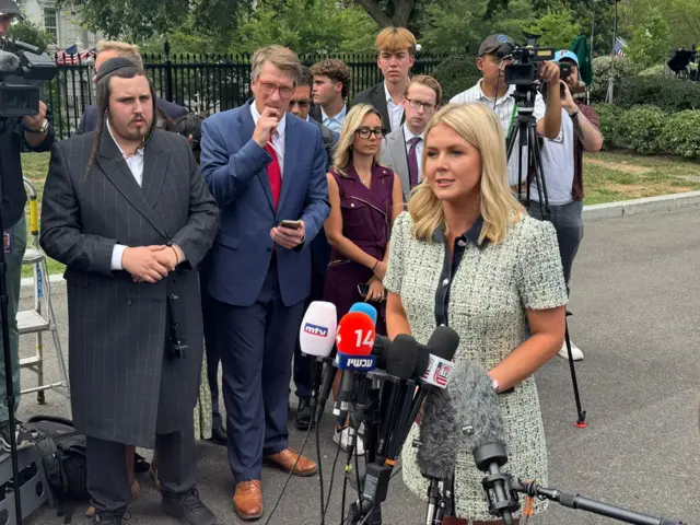 Karoline Leavitt with reporters at the White House