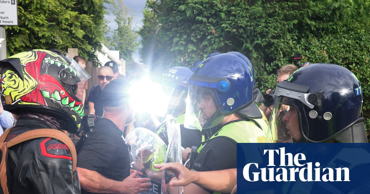 Police warn of ‘inflammatory’ online posts over clashes outside Essex asylum hotel | UK news