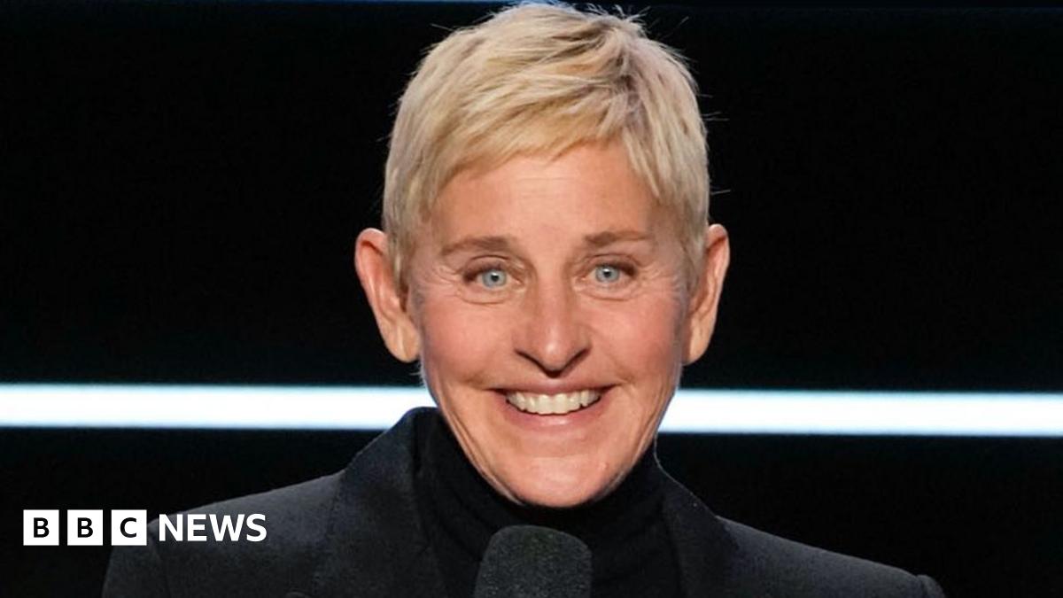 Ellen DeGeneres wearing a black jacket, smiling and speaking at the Carol Burnett: 90 Years of Laughter + Love - Season 2023