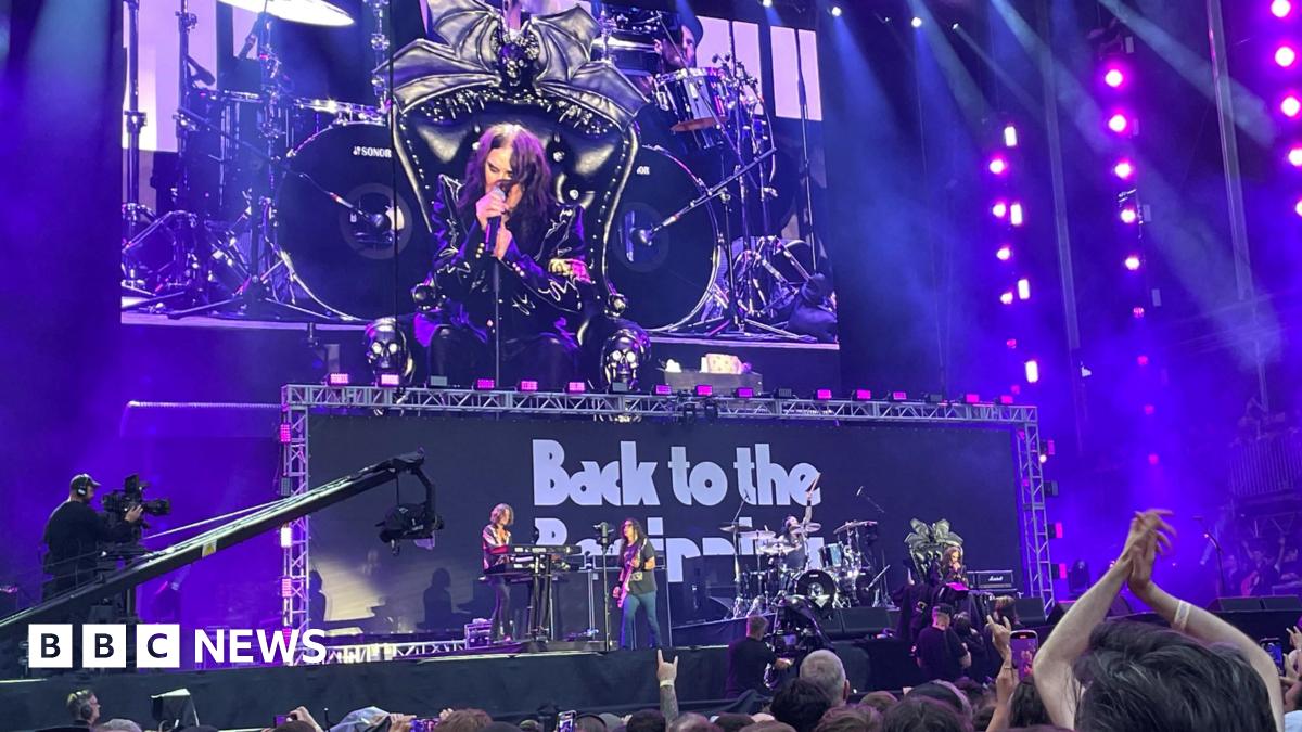 Ozzy Osbourne is seen on a screen as he performs at the Black Sabbath's farewell show