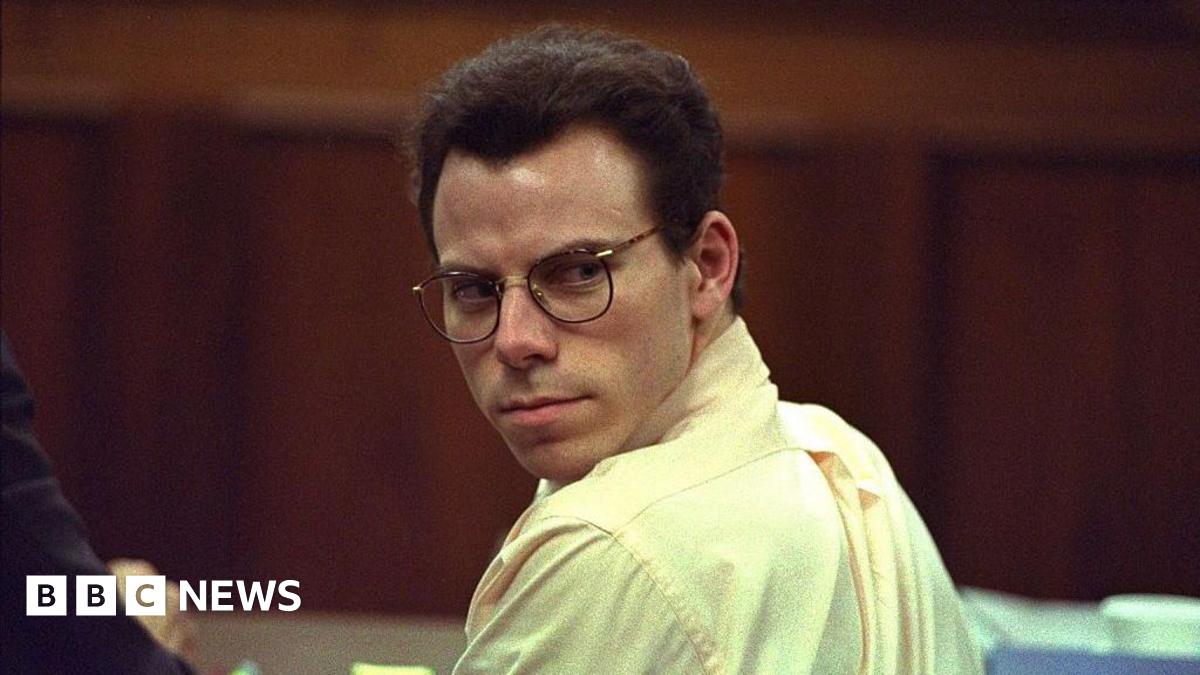 File image of Erik Menendez in a court room, dressed in yellow shirt and glasses