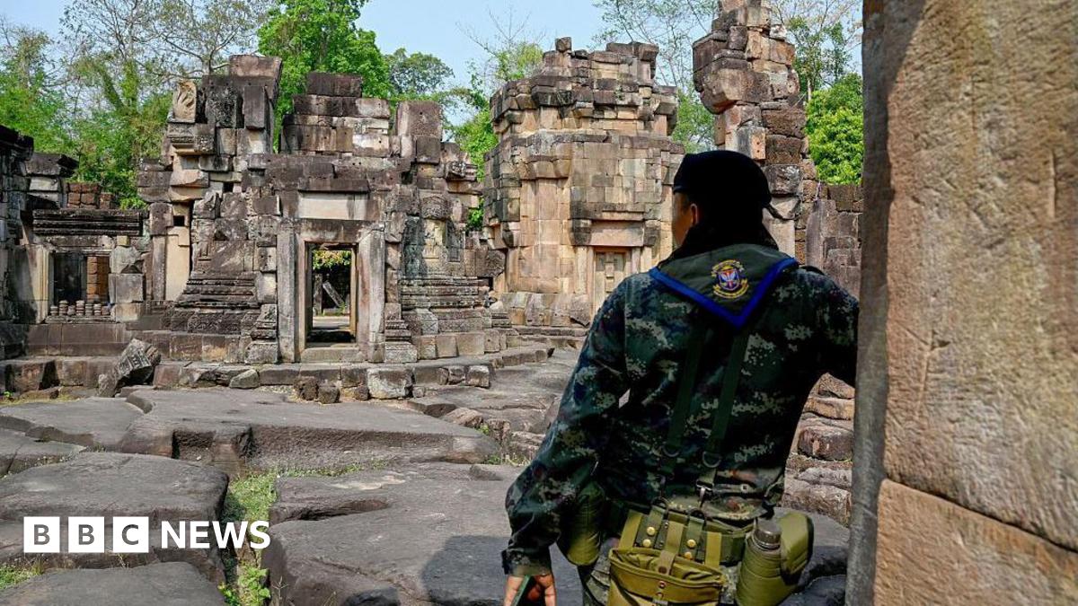 A Thai soldier stands guard at the disputed ancient Khmer temple Prasat Ta Muen Thom, at a disputed area on the Thai-Cambodian border