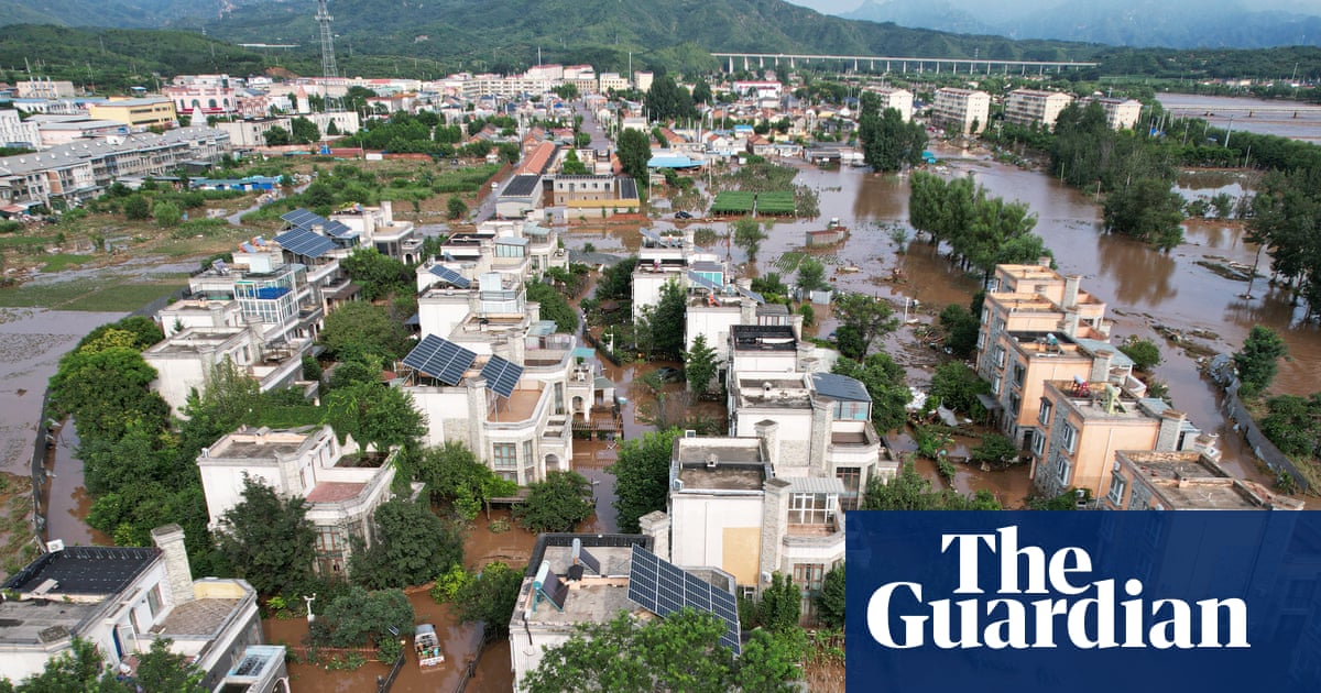 China floods: more than 30 killed in Beijing and tens of thousands evacuated | China