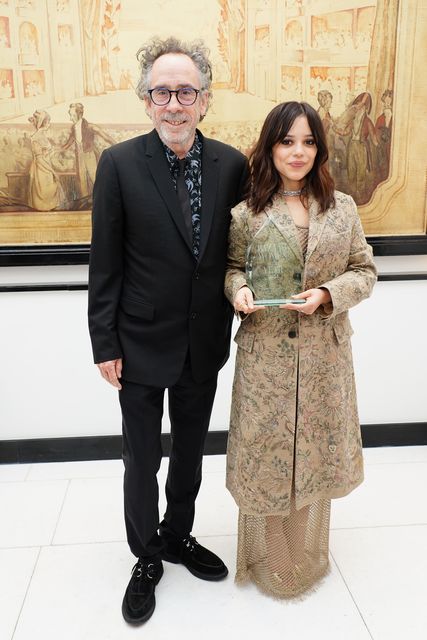 Director Tim Burton with Wednesday star Jenna Ortega (Ian West/PA)