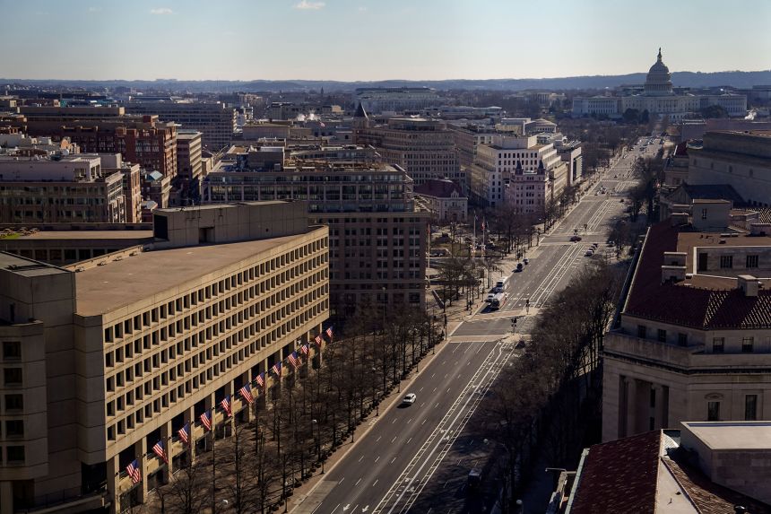 The J. Edgar Hoover Building stands out from the design of other buildings on Pennsylvania Avenue, situated between the White House and the U.S. Capitol.