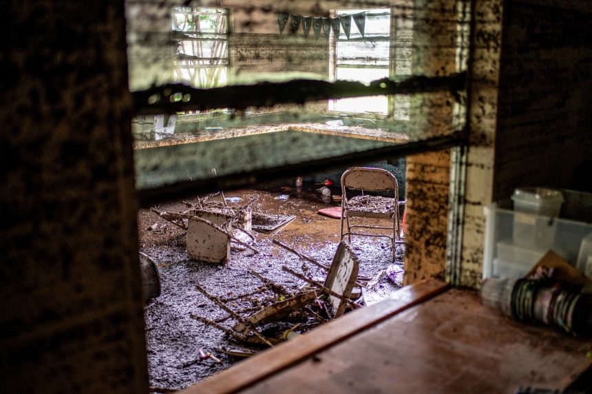 Chairs lie inside a damaged room in a cabin at Camp Mystic in the aftermath of deadly flooding in Kerr County on July 7.