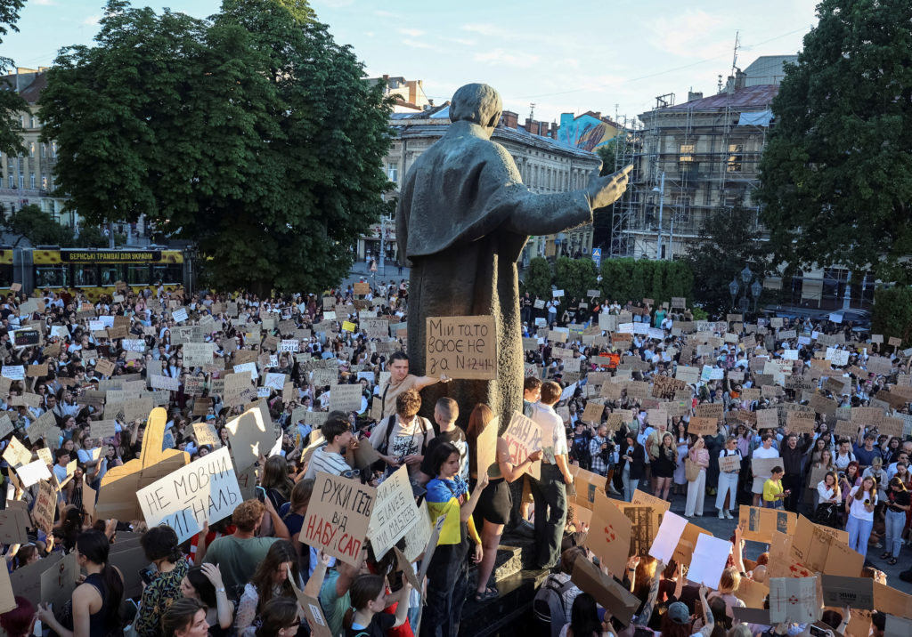 FILE PHOTO: Ukrainians protest against a newly passed law, which curbs independence of anti-corruption institutions in Lviv