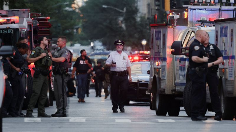 Live updates: Suspect and NYPD officer dead after shooting in midtown Manhattan, source says