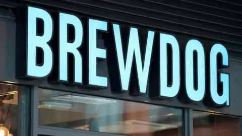 PA The word 'Brewdog' in bold blue letters above a bar