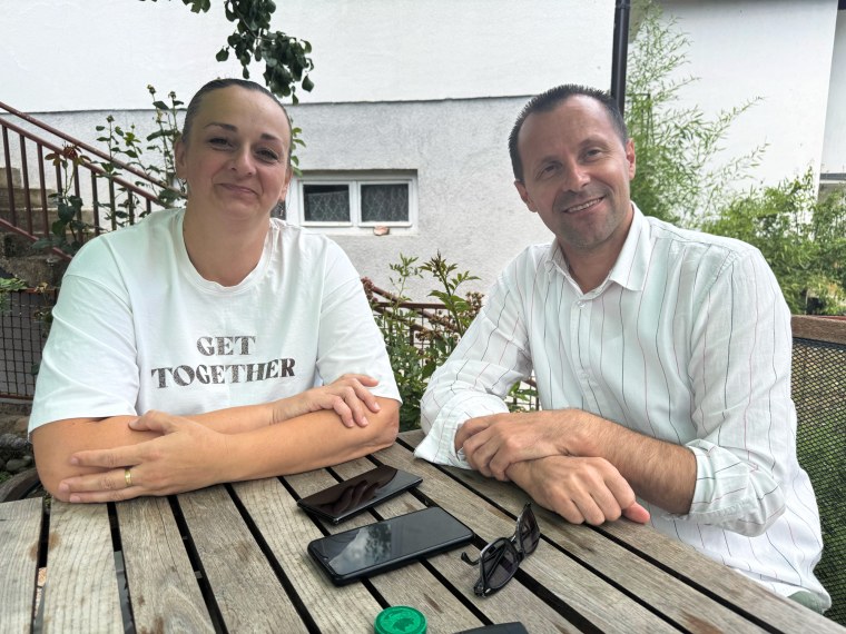 Nedzad Avdic, right, and his wife, Elvisa, in Srebrenica, Bosnia, on July 12.