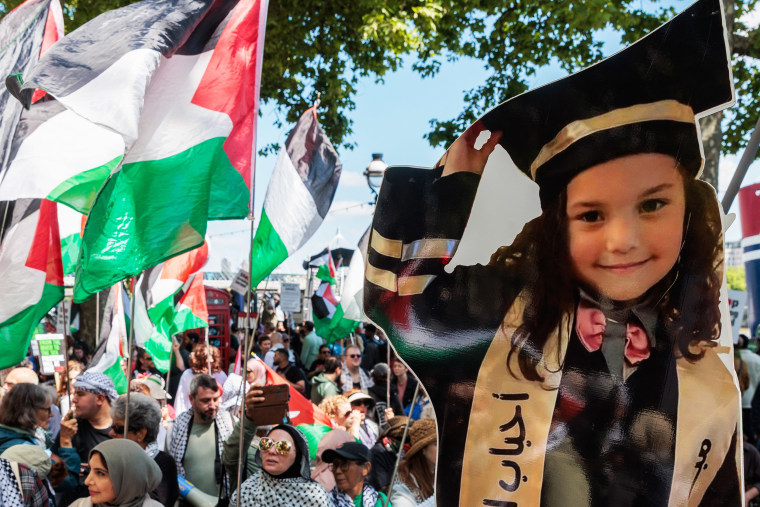 An image of Hind Rajab is held up by demonstrators on May 17 in London.