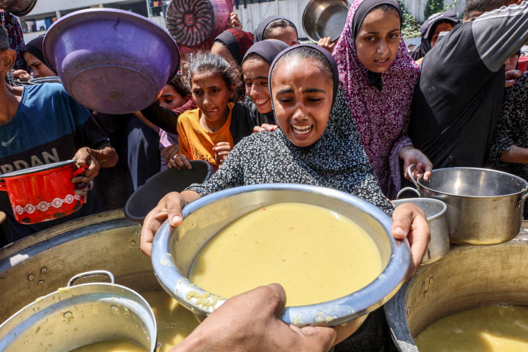 Palestinians struggle to reach food.
