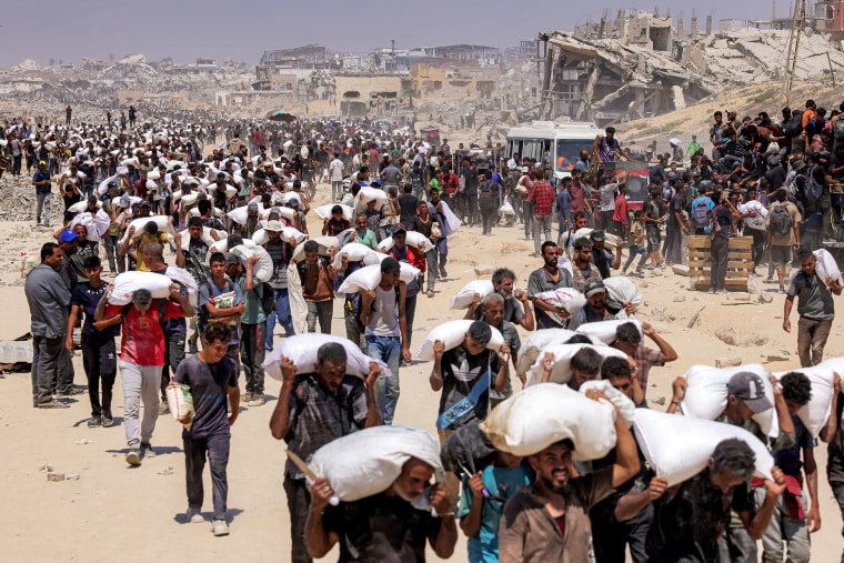 TOPSHOT-PALESTINIAN-ISRAEL-CONFLICT-GAZA-AID