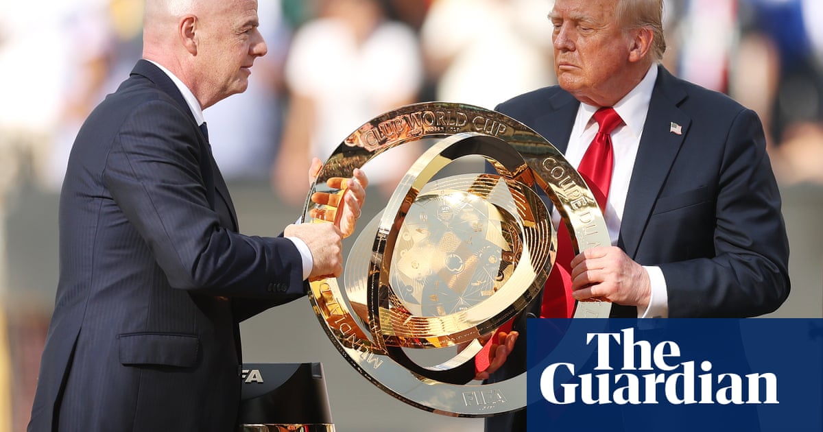 Trump booed but unbowed at Club World Cup final as he crashes Chelsea’s trophy lift | Club World Cup 2025