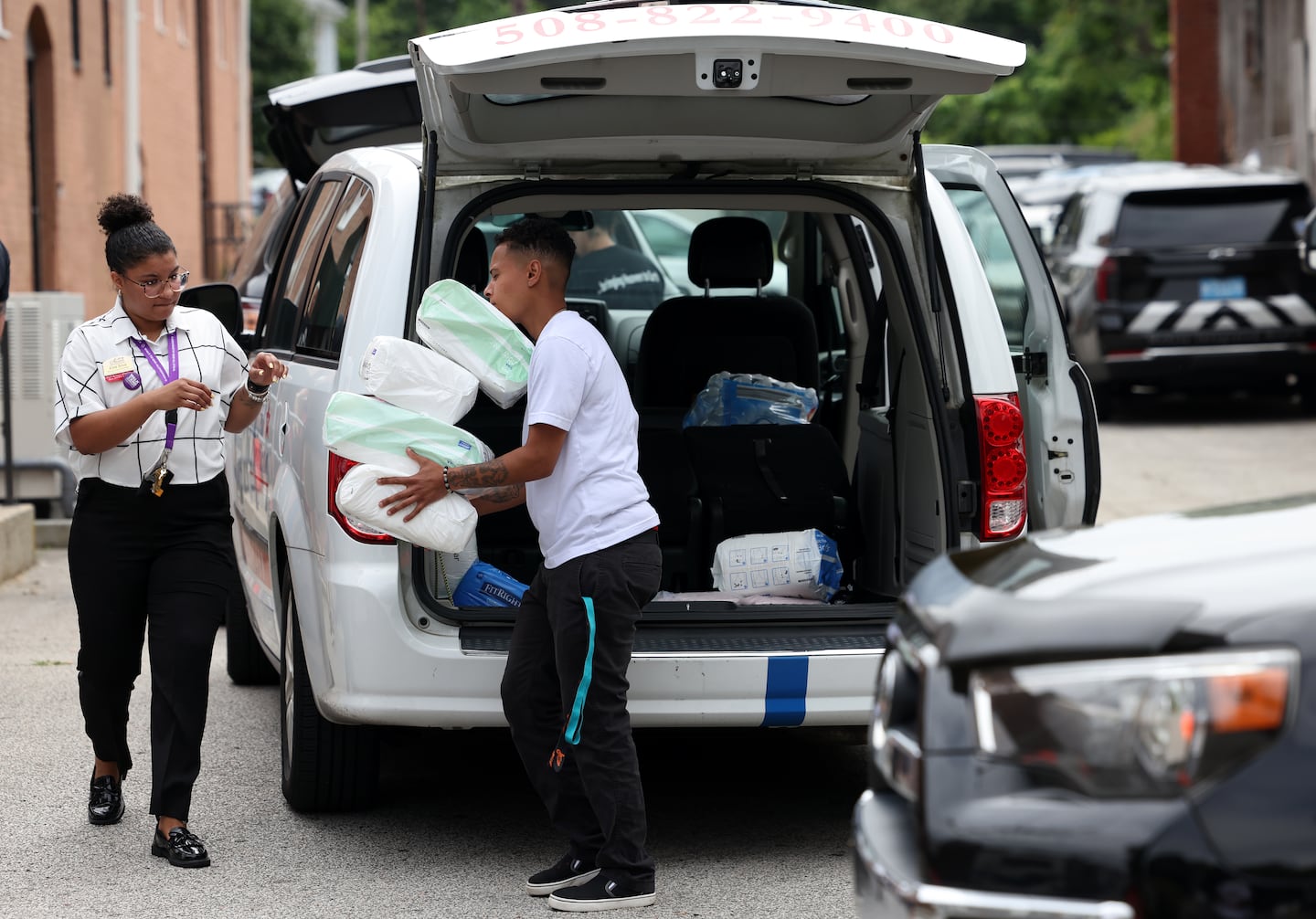 eople arrived with donations to the Timao Center where friends and family were reuniting after a fire at the Gabriel House Assisted Living Facility killed 9 people  in Fall River, MA on July 14, 2025. 