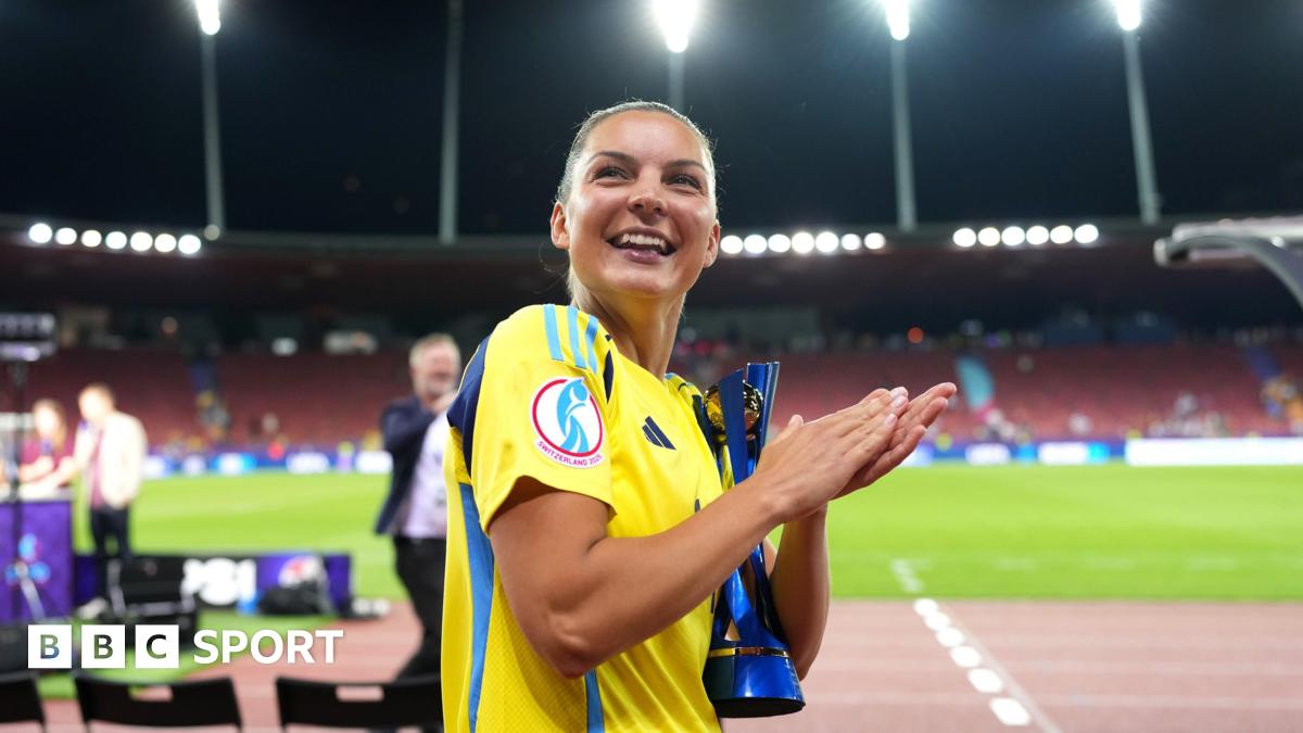 Sweden celebrate with supporter