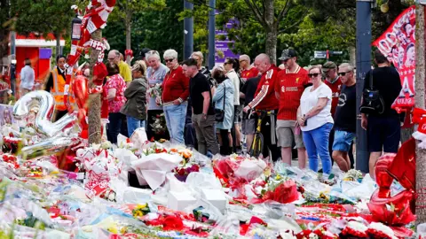 PA Media Tributes at Anfield Stadium, home of Liverpool, in memory of Diogo Jota who has died at the age of 28.