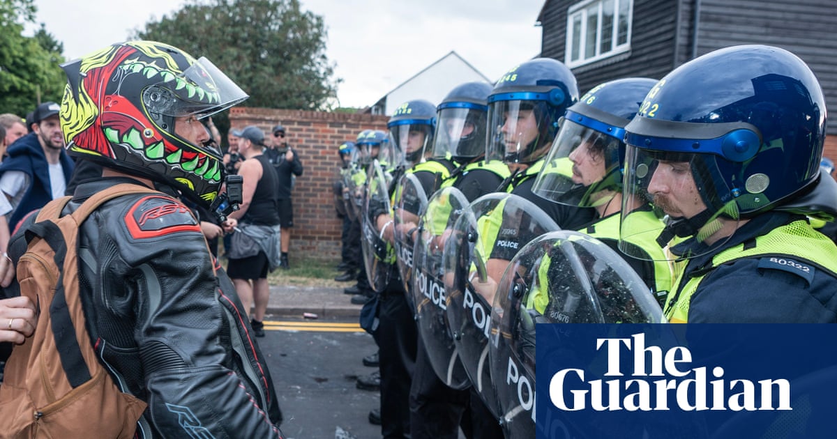 Essex police arrest two after asylum hotel protests turn violent | UK news
