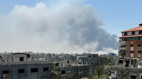 Reuters Smoke rises following Israeli strikes in the Deir al-Balah area, in central Gaza, 21 July 2025