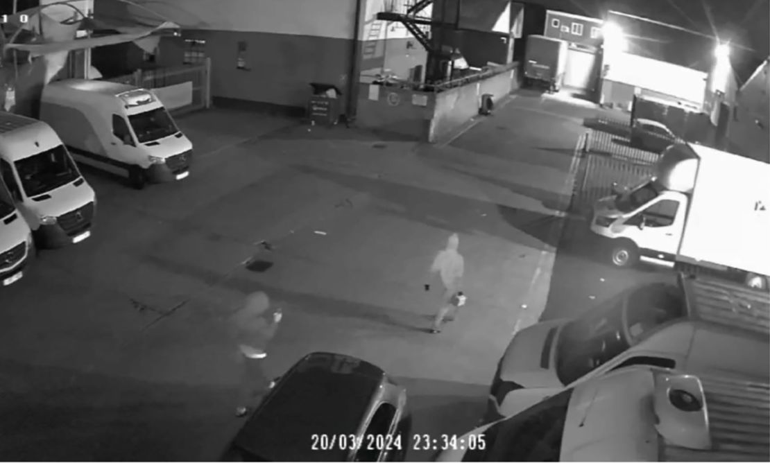 A still from security camera footage showed Mensah and Rose carrying a jerry can at the industrial estate.