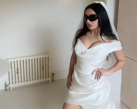 Charli XCX in a wedding dress in her TikTok video.