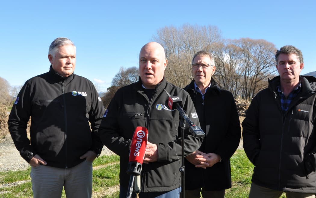 Emergency Management Minister Mark Mitchell, Prime Minister Christopher Luxon, Kaikōura MP Stuart Smith and Tasman Mayor Tim King in Tasman, July 2025.