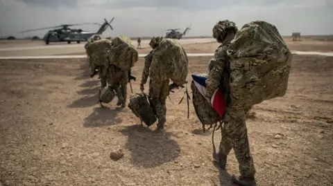PA British troops leaving Camp Bastion in Helmand Provice, Afghanistan, in 2014