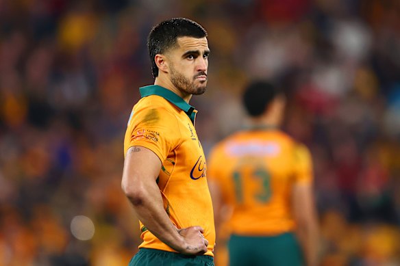 Tom Wright of the Wallabies looks on. 