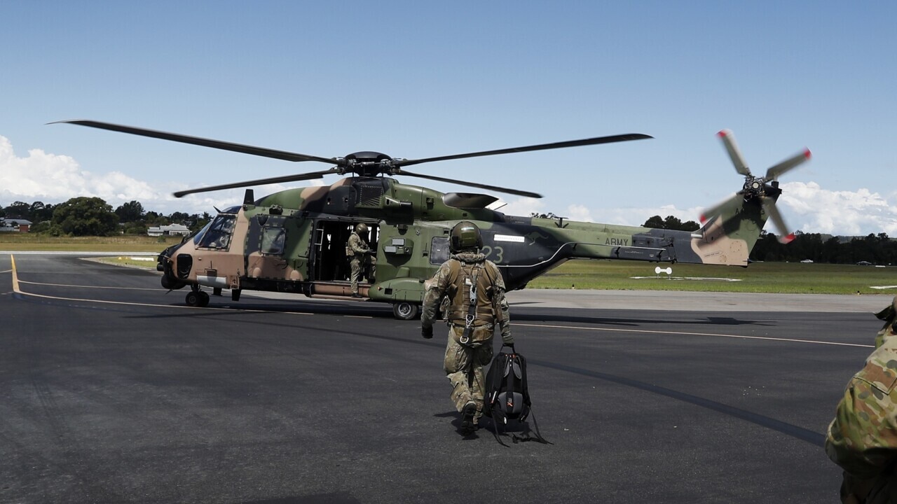 New evidence into Qld Taipan helicopter crash suggests helmet device could be blamed