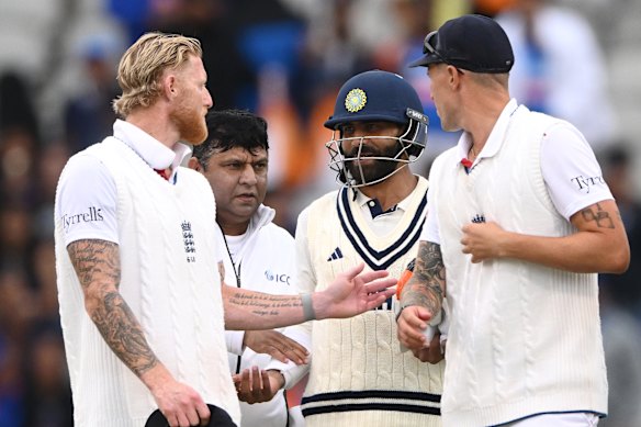 Ben Stokes (left) and Ravindra Jadeja exchange words at the end of the match.