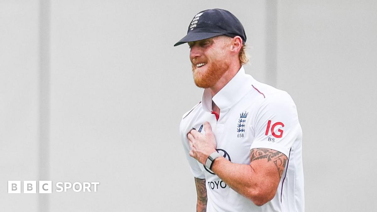 England captain Ben Stokes prods between his right shoulder