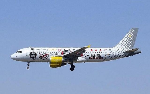 A Vueling plane in flight. (illustrative photo; photo credit: CC-BY Vince_Vega, flickr)