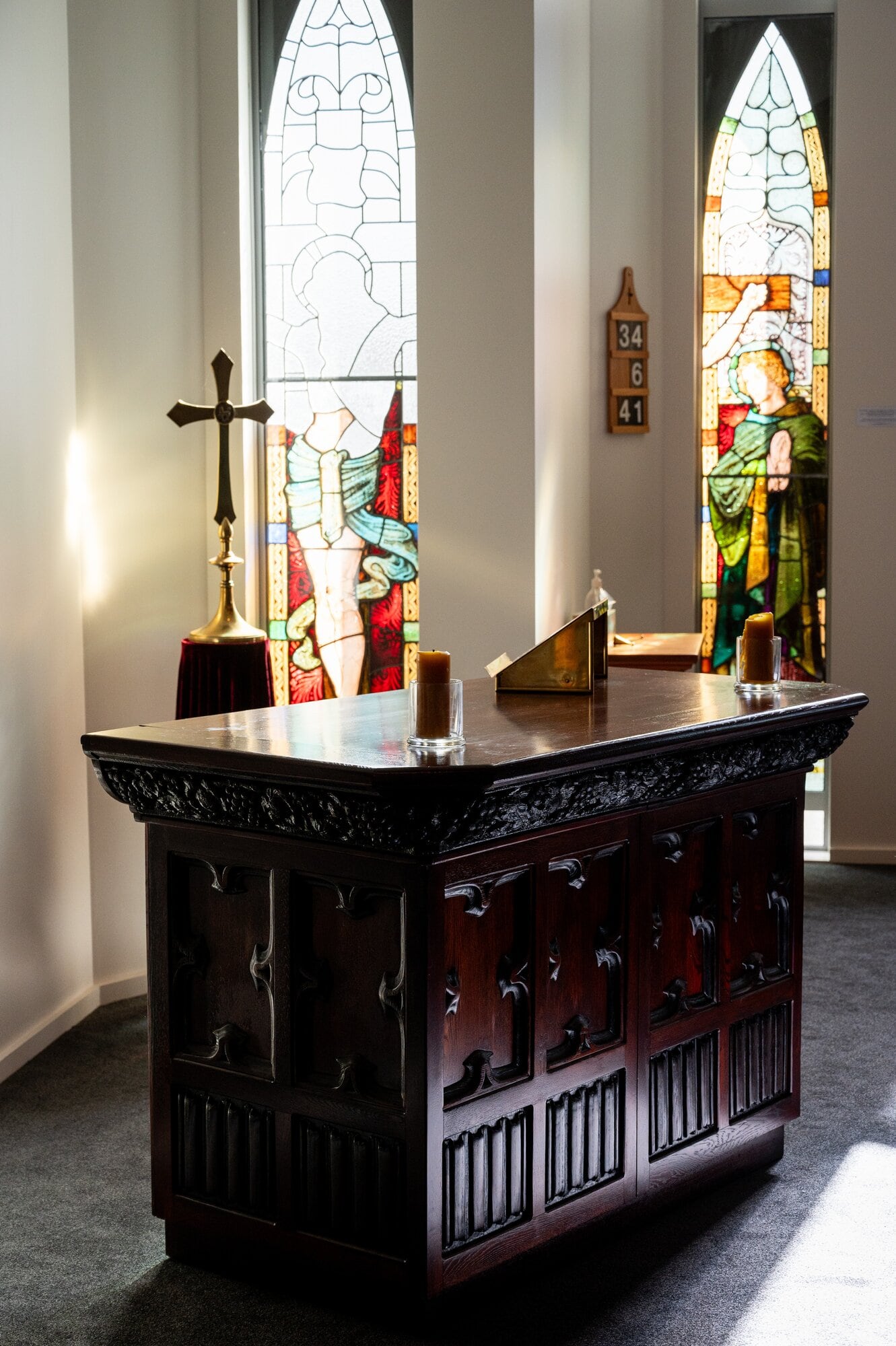  The panels from the original pulpit were damaged in the fire, but David Moorhouse took them and rebuilt them as the basis for the altar in the chapel. Photo / Brydie Thompson