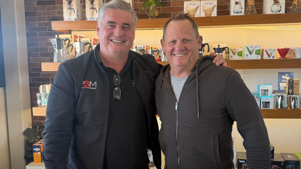 Chris Orr with client and newly appointed Kangaroos coach Kevin Walters.