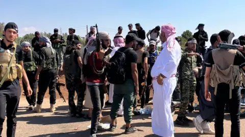 BBC Bedouin fighters outside Suweida