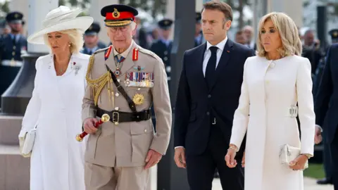 EPA Britain's Queen Camilla, Britain's King Charles III, France's President Emmanuel Macron and French President's wife Brigitte Macron attend the UK Ministry of Defence and the Royal British Legion's commemorative ceremony marking the 80th anniversary of the World War II 'D-Day' Allied landings in Normandy