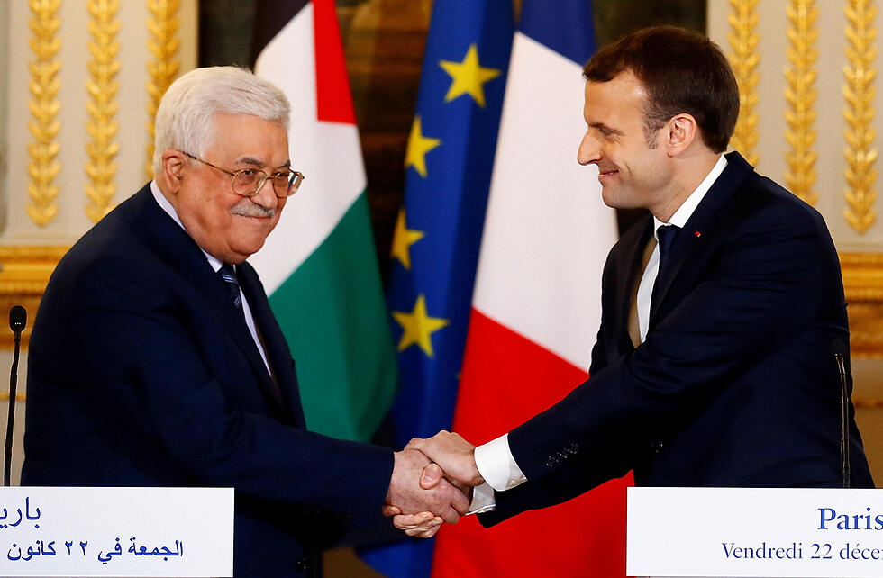 Palestinian Authority Chairman Mahmoud Abbas and French President Emmanuel Macron 