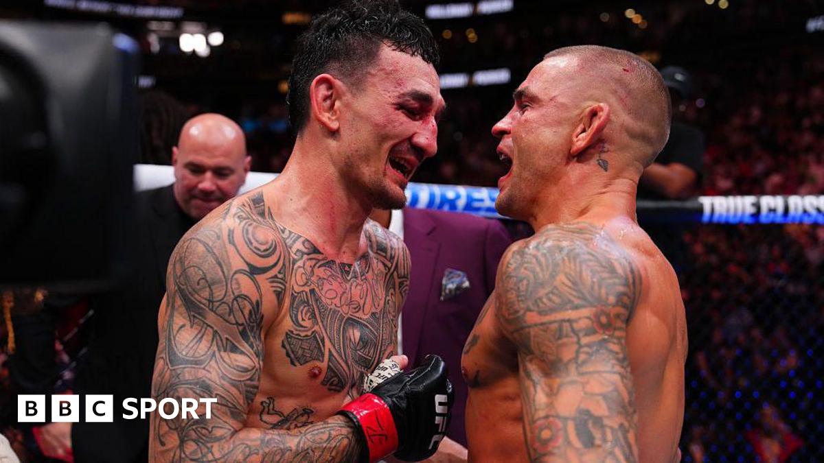 Max Holloway and Dustin Poirier embrace after UFC 318