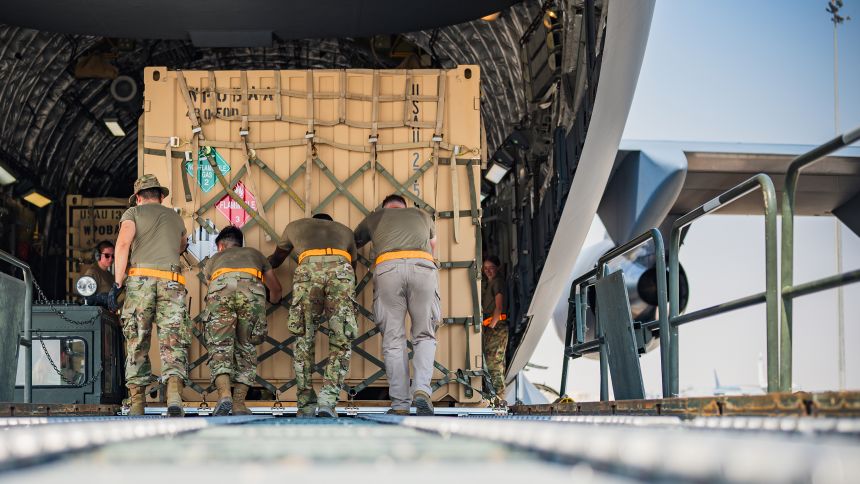 US Air Force aerial porters load Terminal High Altitude Area Defense (THAAD) support equipment being sent to Israel onto a C-17 Globemaster III on Oct. 16, 2024.