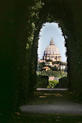 The view of St Peter’s Basilica as seen from the Aventine Keyhole in Rome – three countries in one view.