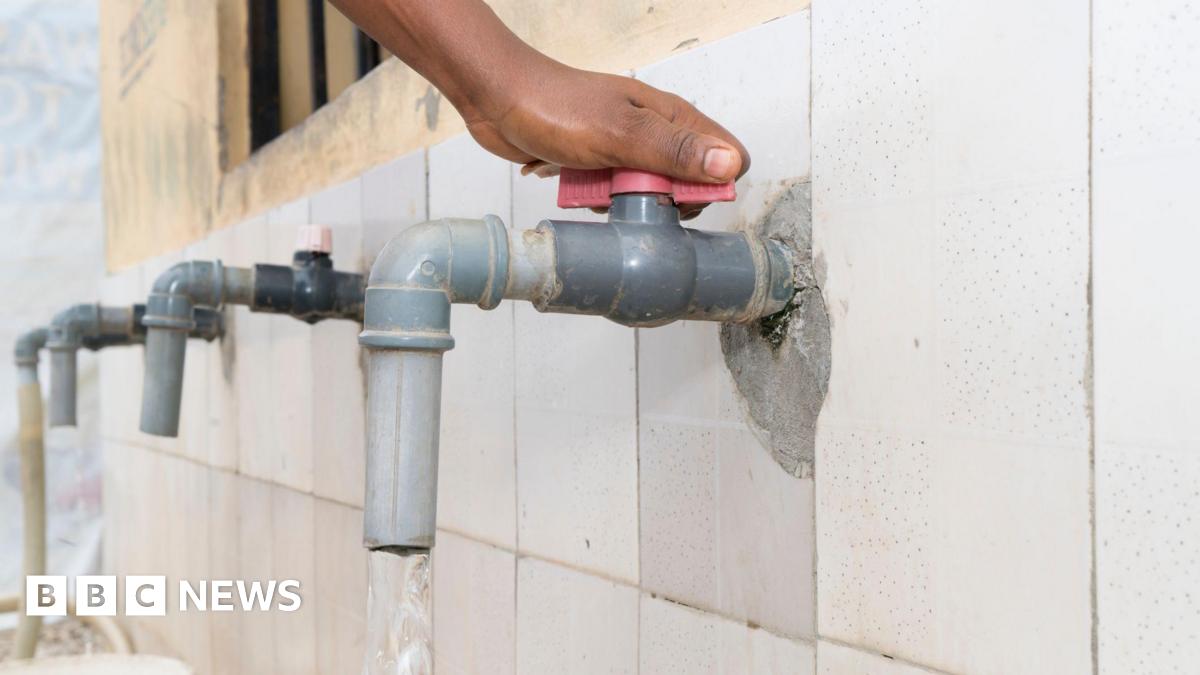 Humanitarian aid including water, rice, cooking oil, flour, tinned goods and baby formula wrapped in a Union Flag is airdropped over Gaza from a RAF A400M aircraft.