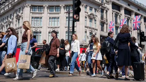 Getty Images Shoppers on Oxford Street, London