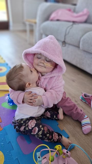 The Duggan family are fundraising to send Éabha (right) for a bone marrow transplant just weeks afterher three-year-old sister Saoirse (left) passed away. 