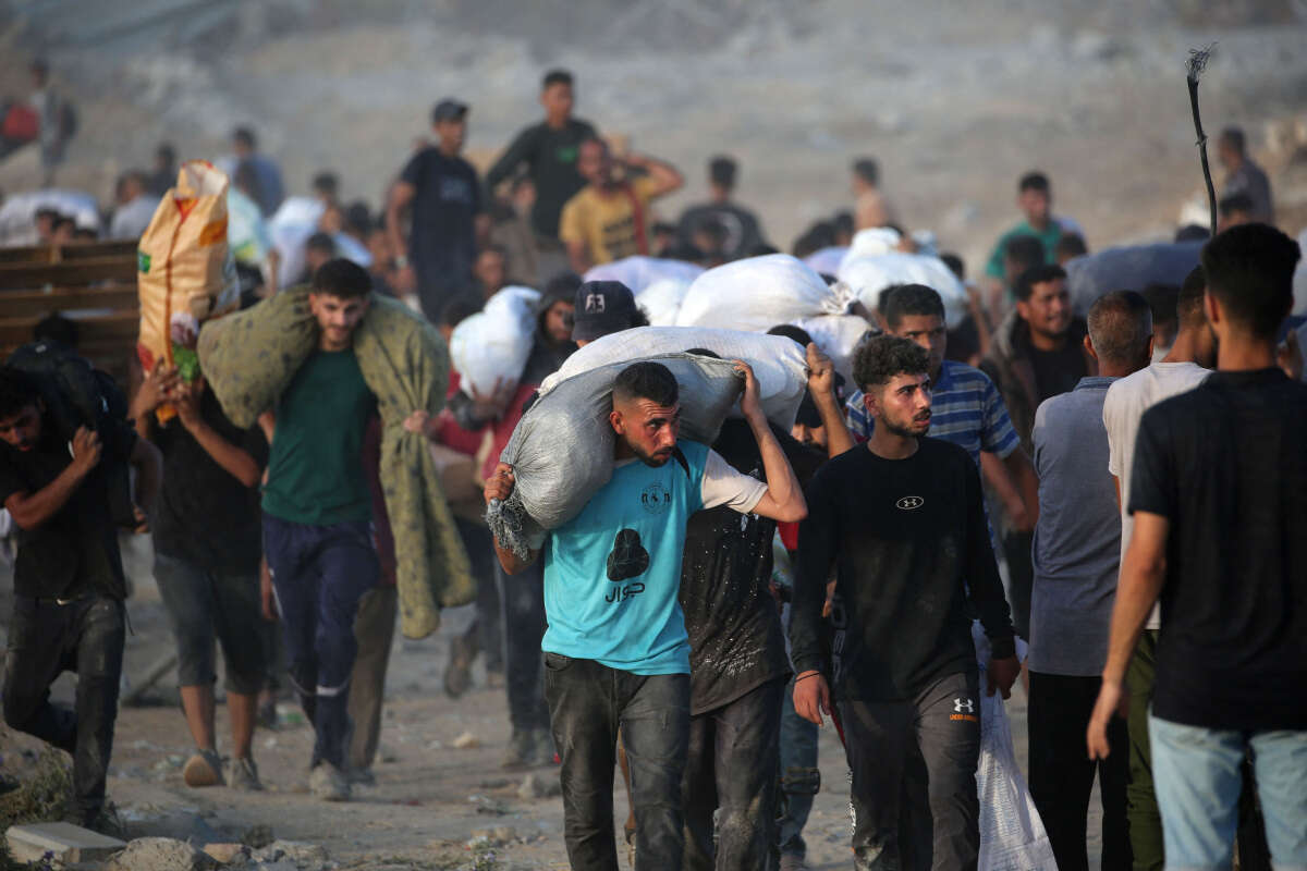 עזתים ברצועה עם הסיוע ההומניטרי של GHF , אי.אף.פי