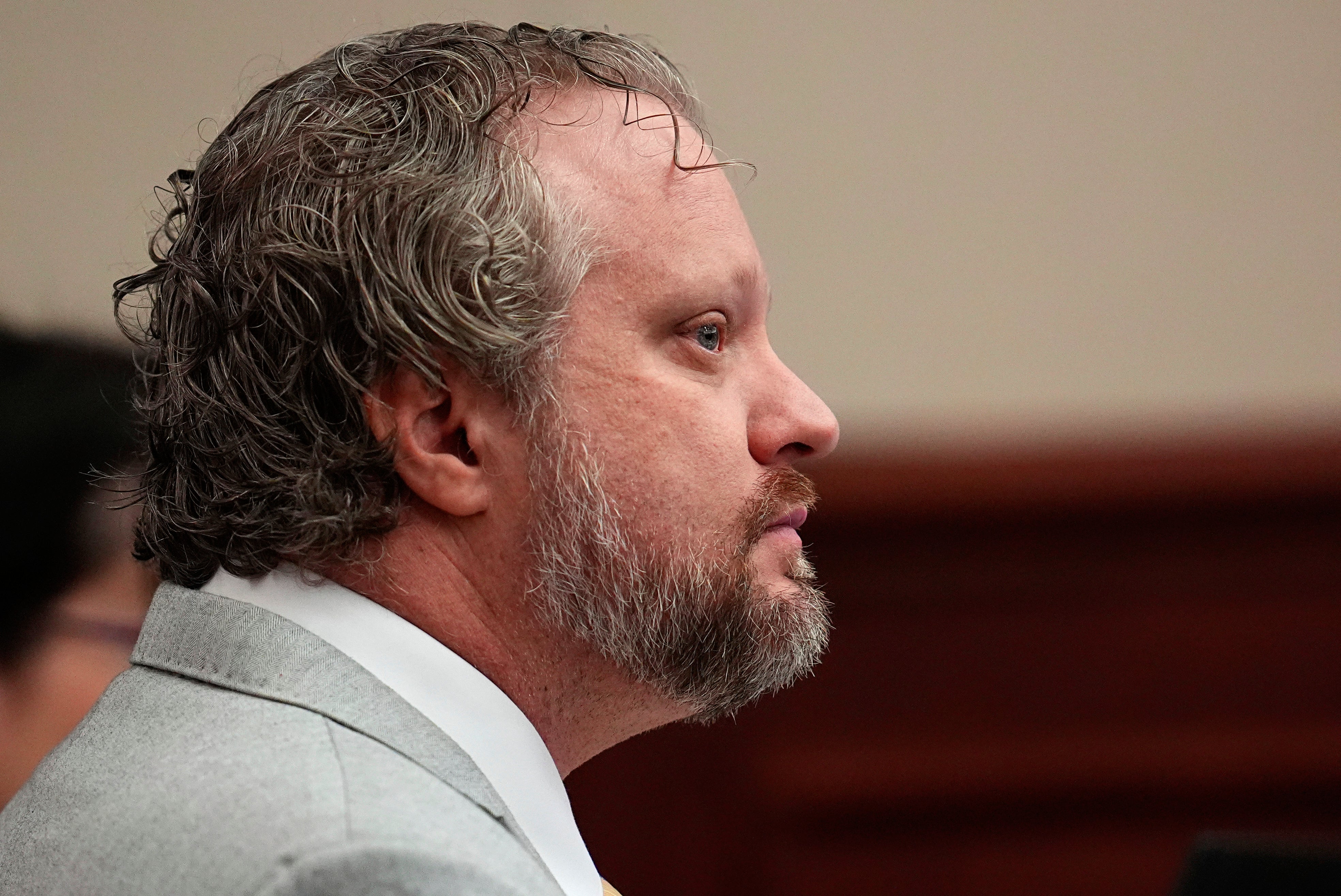Craig listens to closing arguments during his murder trial in district court in Arapahoe County