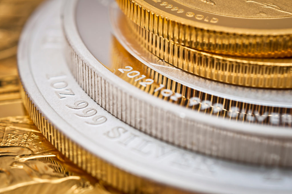 Gold price drops as trade concerns ease, while silver price rallies