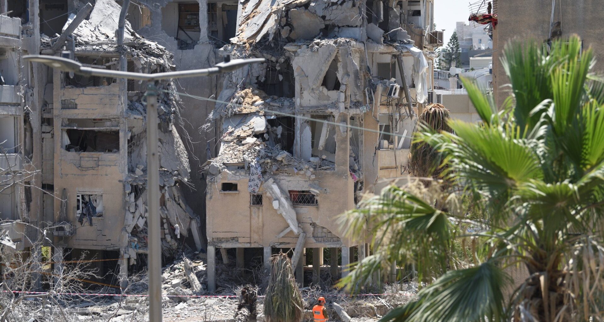 Holon residents fume at event feting demolition of homes damaged by Iran